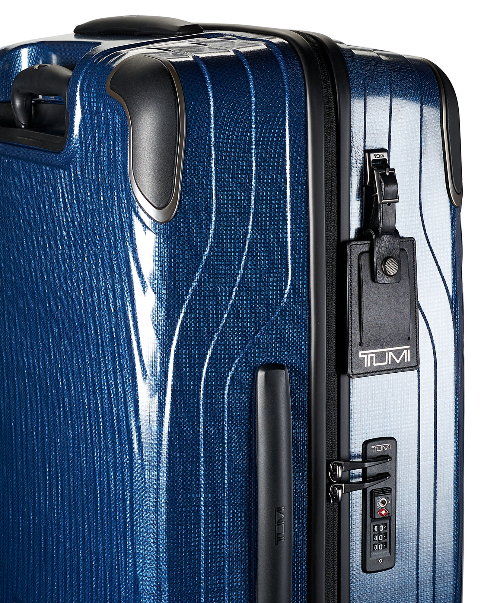 tumi blue luggage